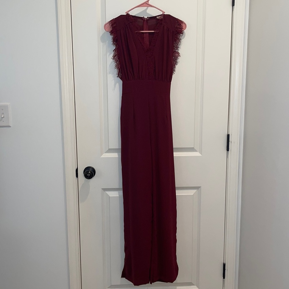 Altard state crimson jumpsuit with lace details. Worn twice. Altered to be XS